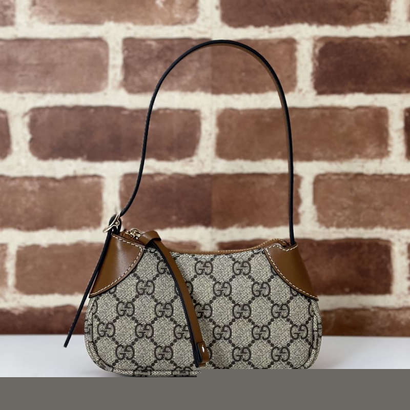 G*u*i top handle bags